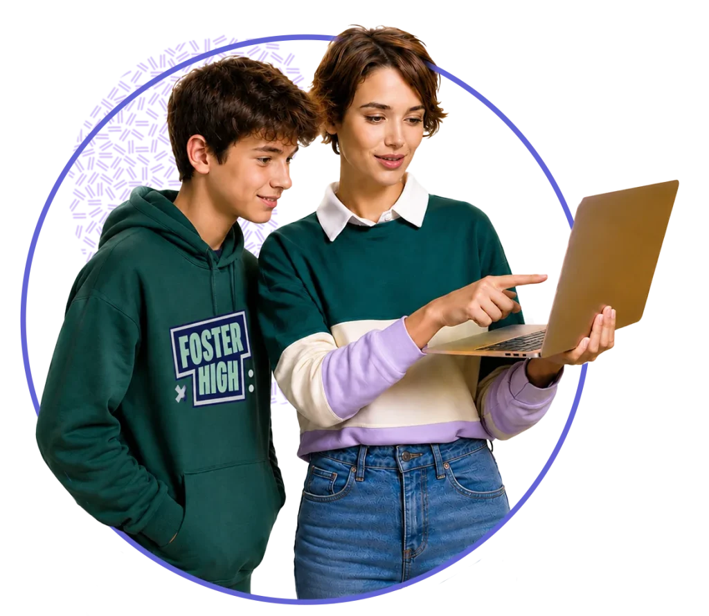 Nauczycielka Foster High pokazuje uczniowi rozwiązanie zadania na laptopie
